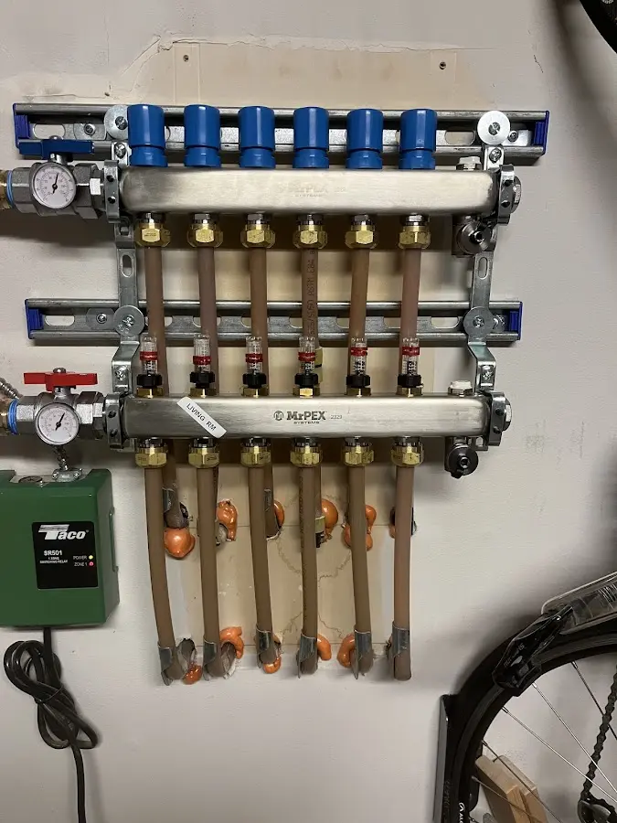 Plumber performing Water Heater Repair at a residential property in Richmond West